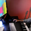 A student editing a piece of music