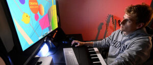 A student editing a piece of music
