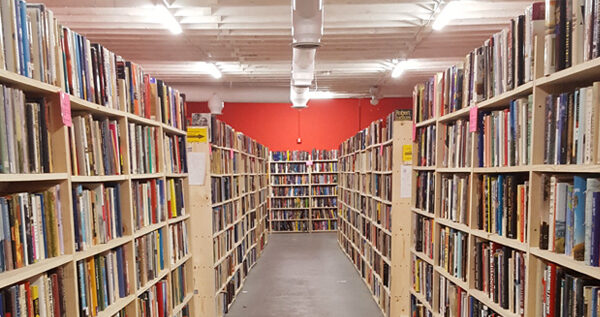 A long aisle lined with bookshelves.