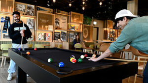 Students playing pool