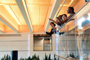 A group of students looking over a railing